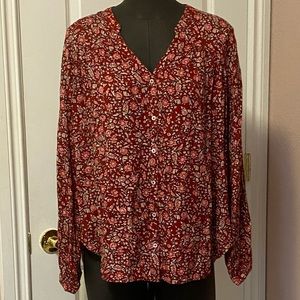 Red floral blouse
